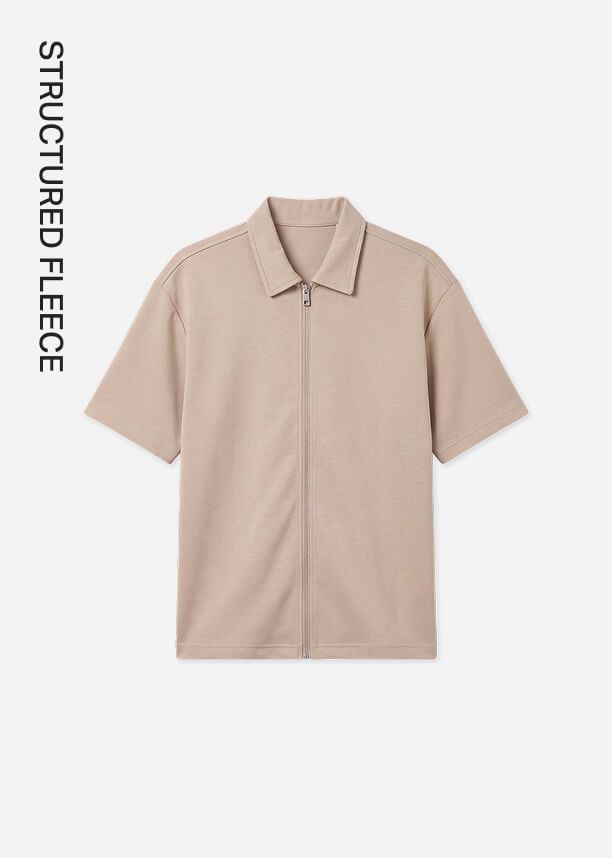Men's beige structured fleece short-sleeve zip shirt with collar.