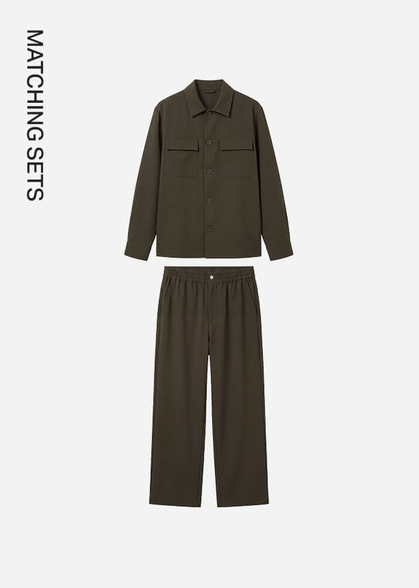 Olive green men's matching set with button-up overshirt and trousers on a light background, showcasing the brand's coordinated outfits collection.