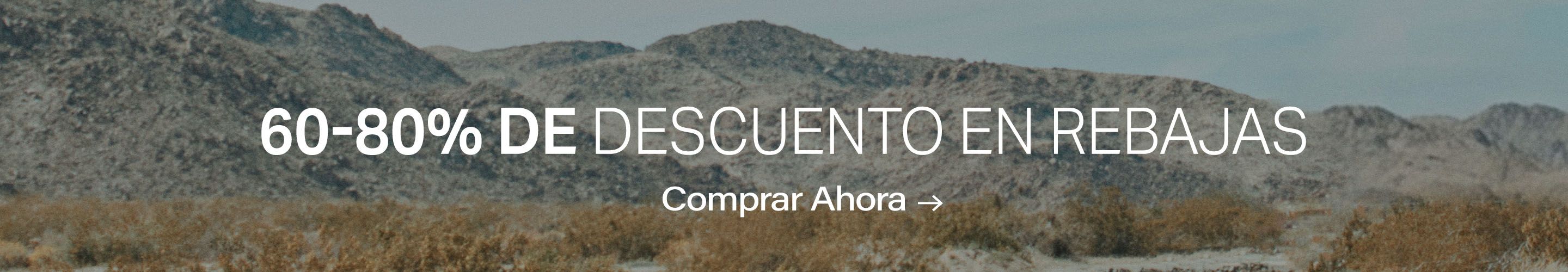 Paisaje desértico con montañas tenues; texto promocional: "¡60-80% DE DESCUENTO EN REBAJAS! Comprar Ahora." ¡Encuentra grandes ofertas!