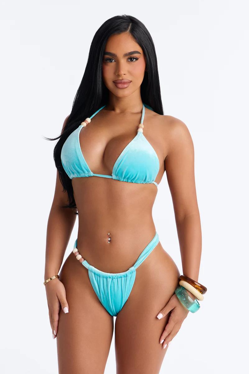 Aqua velvet beaded bikini set. Stylish high-cut swimwear for women. Perfect summer beach fashion.
