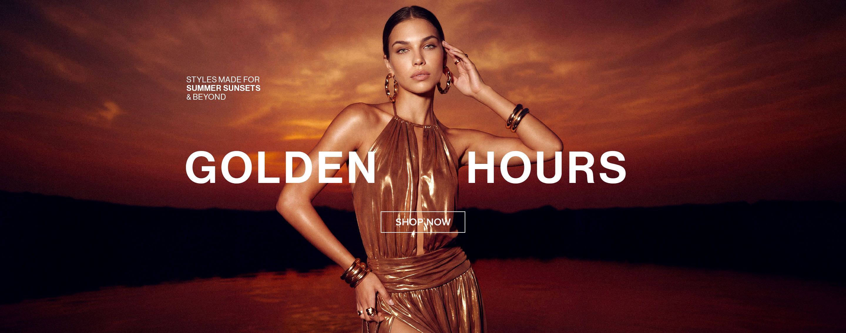 Woman in a metallic gold dress with matching accessories, against an orange sunset. Shop new Golden Hours summer styles now.