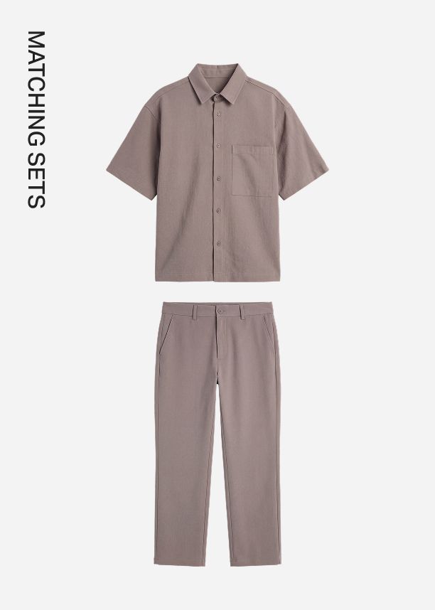 Men's mauve-taupe matching set featuring a short-sleeve button-down shirt and trousers, showcasing a stylish and cohesive summer outfit category.