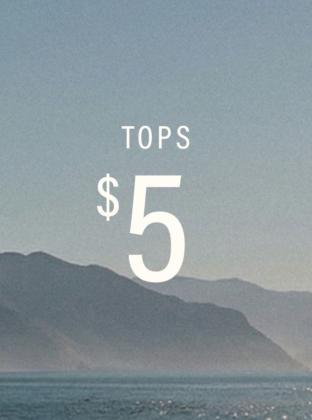 White "TOPS $5" text against a hazy blue-gray mountain and ocean landscape. Shop women's tops at this incredible $5 clothing sale!