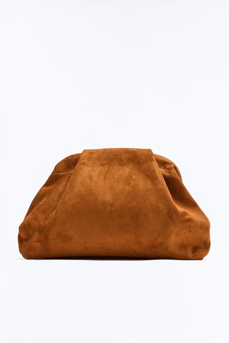 Slouchy brown suede pouch clutch bag for women.