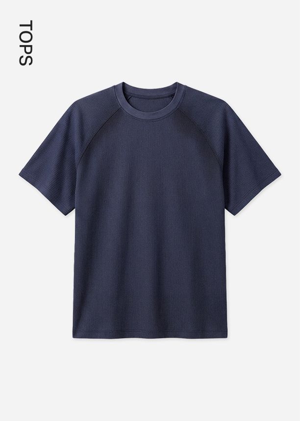 Navy blue ribbed crew neck t-shirt with raglan sleeves on a light background, showcasing the collection for the men's tops category page.