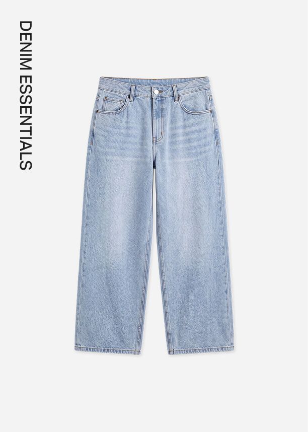 Light wash high-waisted wide-leg jeans with a relaxed fit, a classic denim essential.