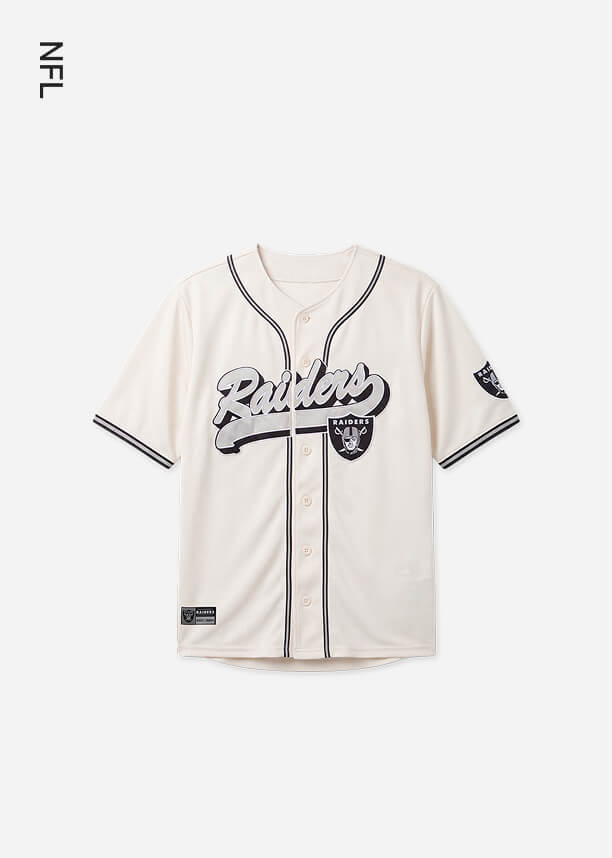 Cream-colored Las Vegas Raiders baseball jersey featuring black cursive script and team logo, showcasing the new NFL apparel collection.