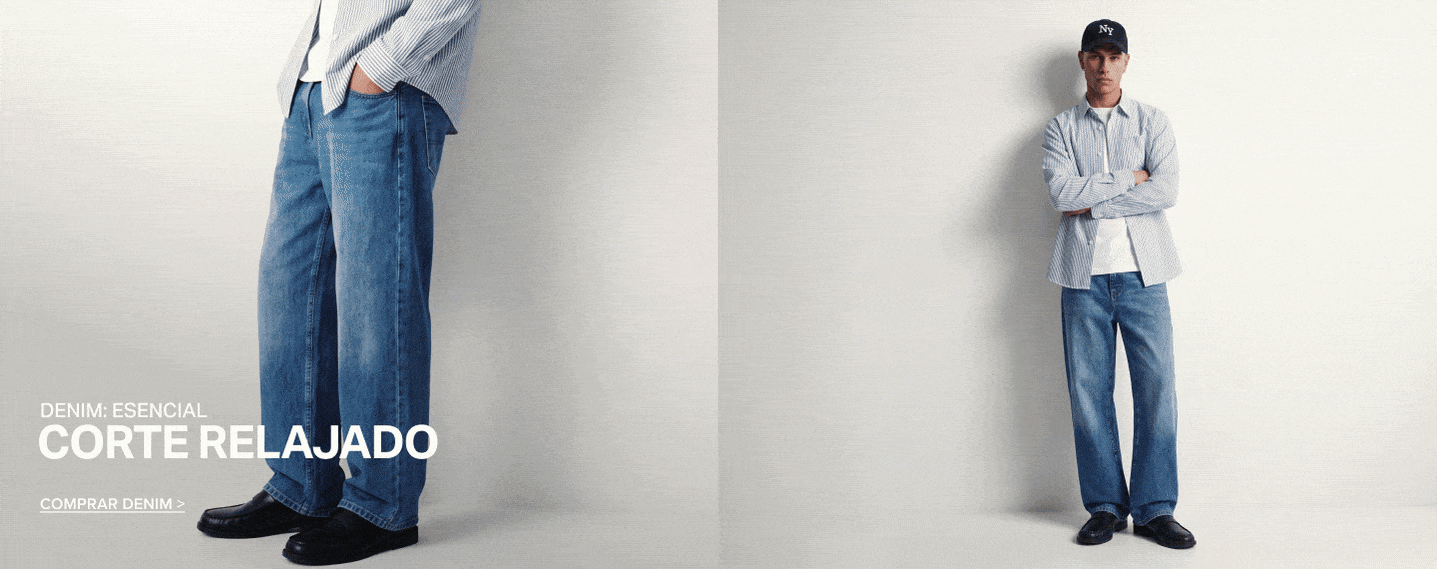 Hombre con camisa de rayas y jeans de corte relajado promocionando la colección de mezclilla masculina. Compra estilos casuales sueltos.