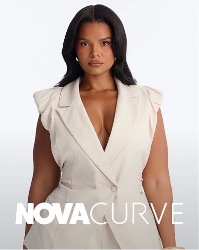 Confident woman in a cream sleeveless blazer vest, showcasing trendy NovaCurve plus size apparel. Ideal for modern women's fashion.