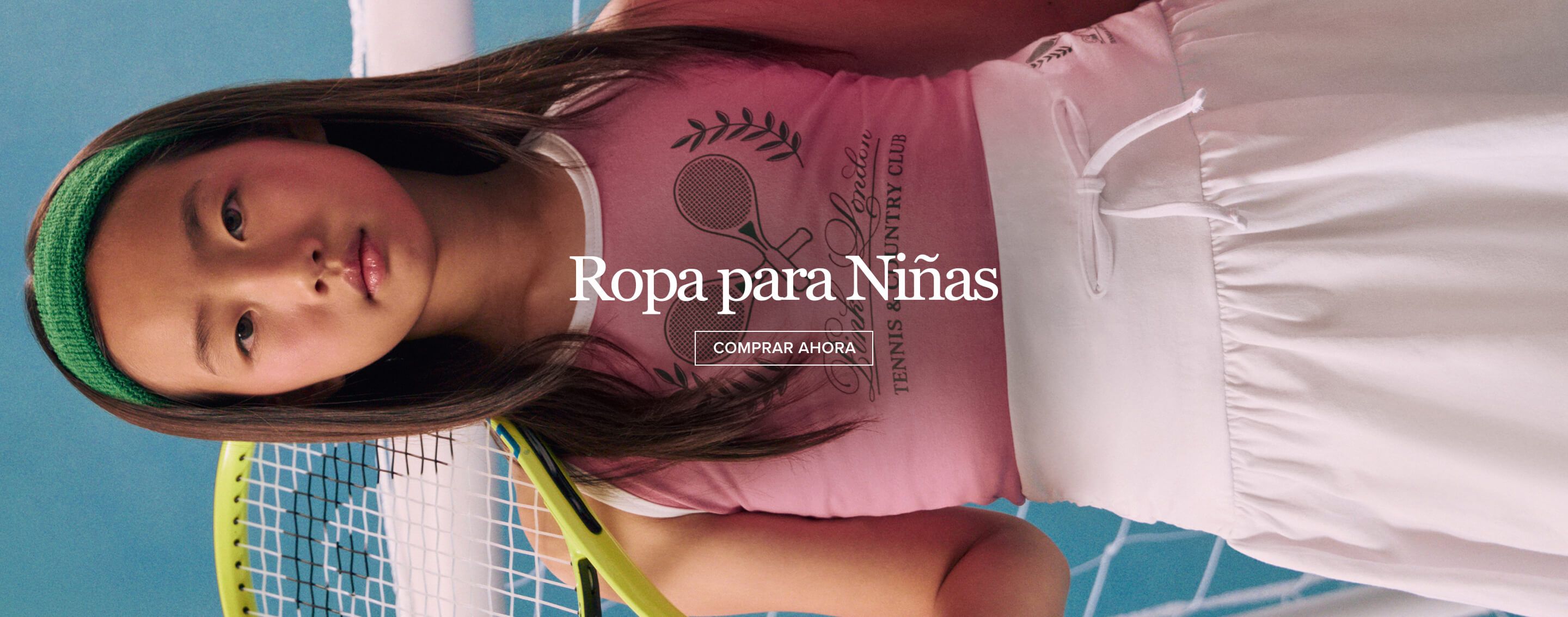 Dos niñas con ropa deportiva rosa y verde, una con balón de fútbol, frente a una red. Promociona "Girls Clothing" con "SHOP NOW" para moda infantil.