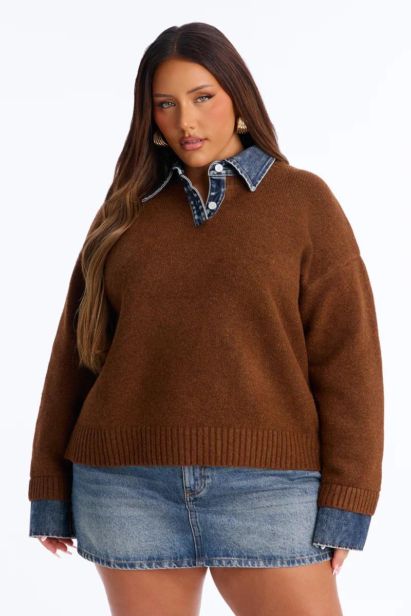 Plus size woman wearing a brown knit sweater with a layered denim collar and denim skirt.