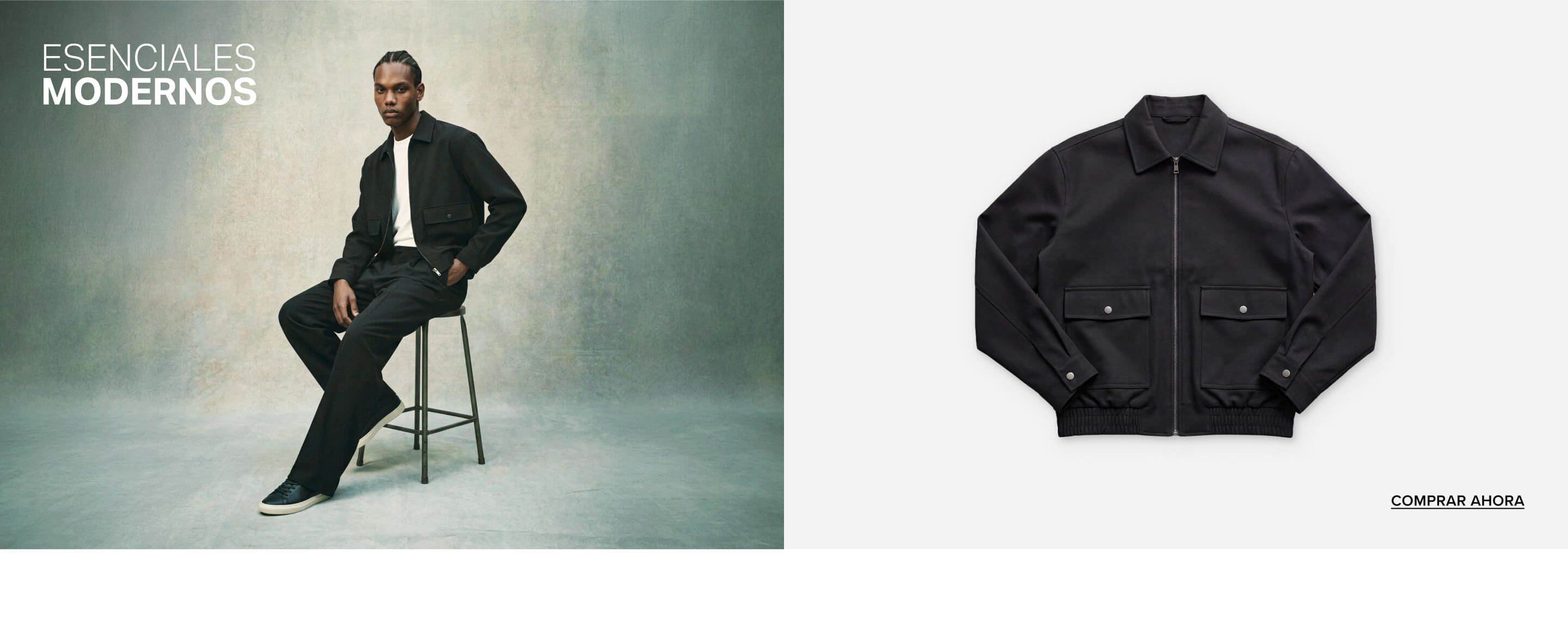 Hombre con chaqueta, camiseta y pantalones negros, zapatillas, sentado en taburete. Promueve esenciales de moda masculina moderna.