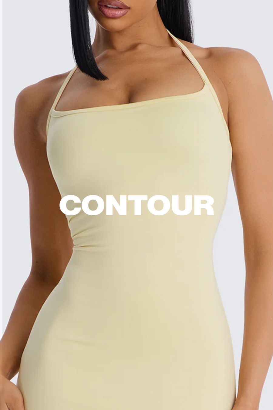 Woman in light yellow halter neck top with square neckline, showcasing the new CONTOUR activewear collection, emphasizing body-sculpting.