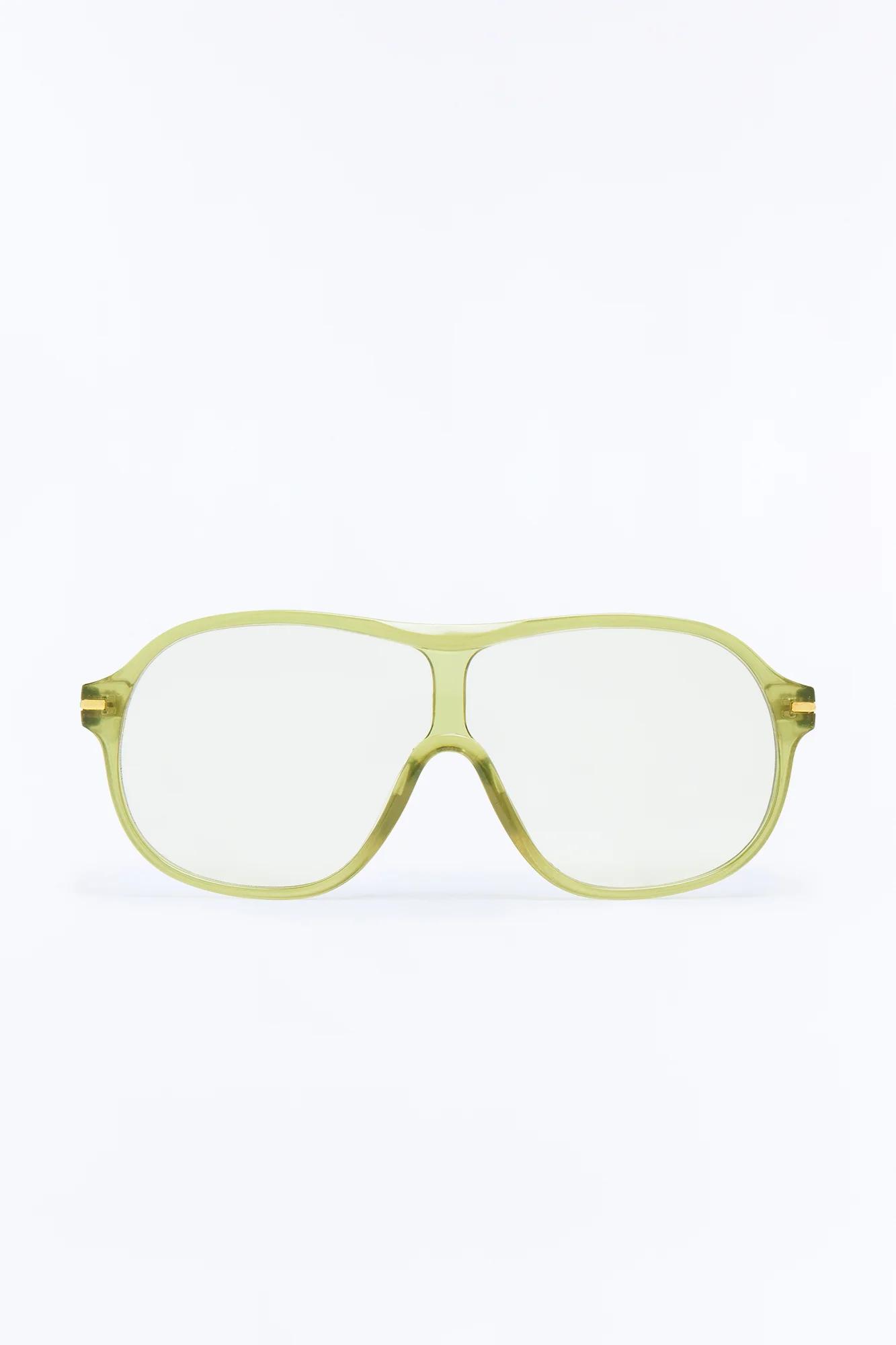 Stylish light green aviator sunglasses with clear lenses and gold temple accents, showcasing a fresh summer eyewear collection.