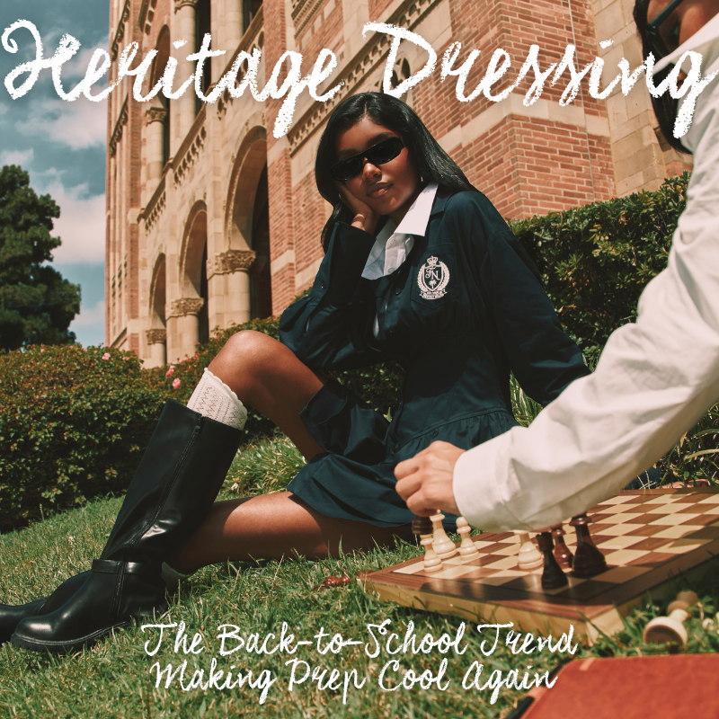 Woman wearing a preppy navy blazer, pleated skirt, knee-high boots, and sunglasses playing chess on a college campus for Fashion Nova’s heritage dressing back-to-school trend.