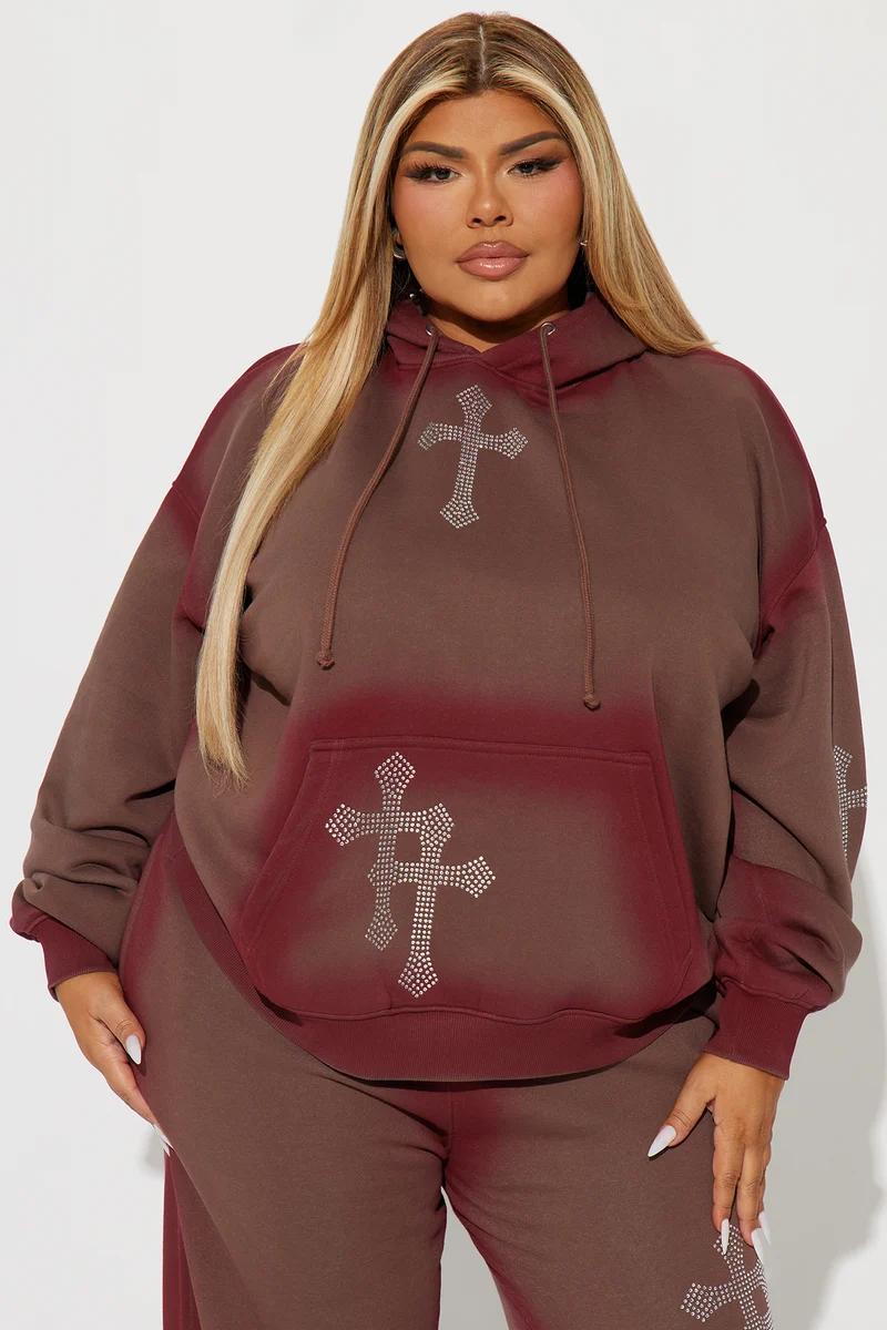 Plus size brown and burgundy ombre hoodie with rhinestone cross graphics.