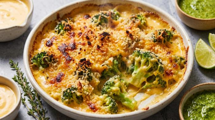 A generous scoop of creamy broccoli casserole with a golden breadcrumb topping.