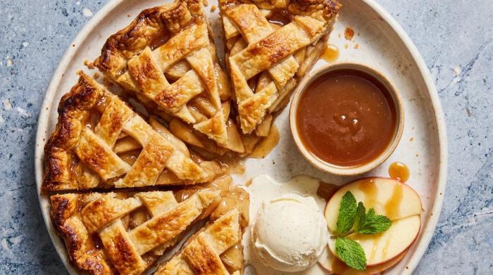 A freshly baked apple pie with a golden lattice crust