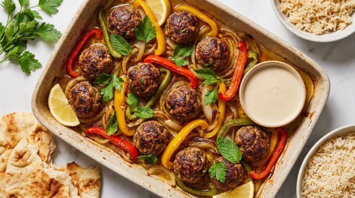 A warm pita bread stuffed with lamb kofta meatballs, roasted peppers, and drizzled sauce.