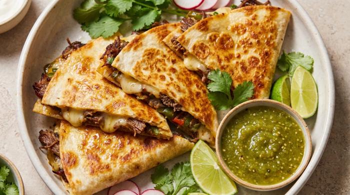 Stack of freshly cooked quesadillas.