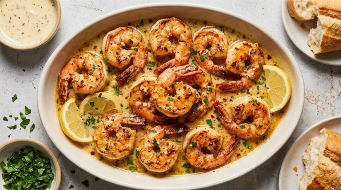 Creamy garlic prawns spooned generously over mashed potatoes