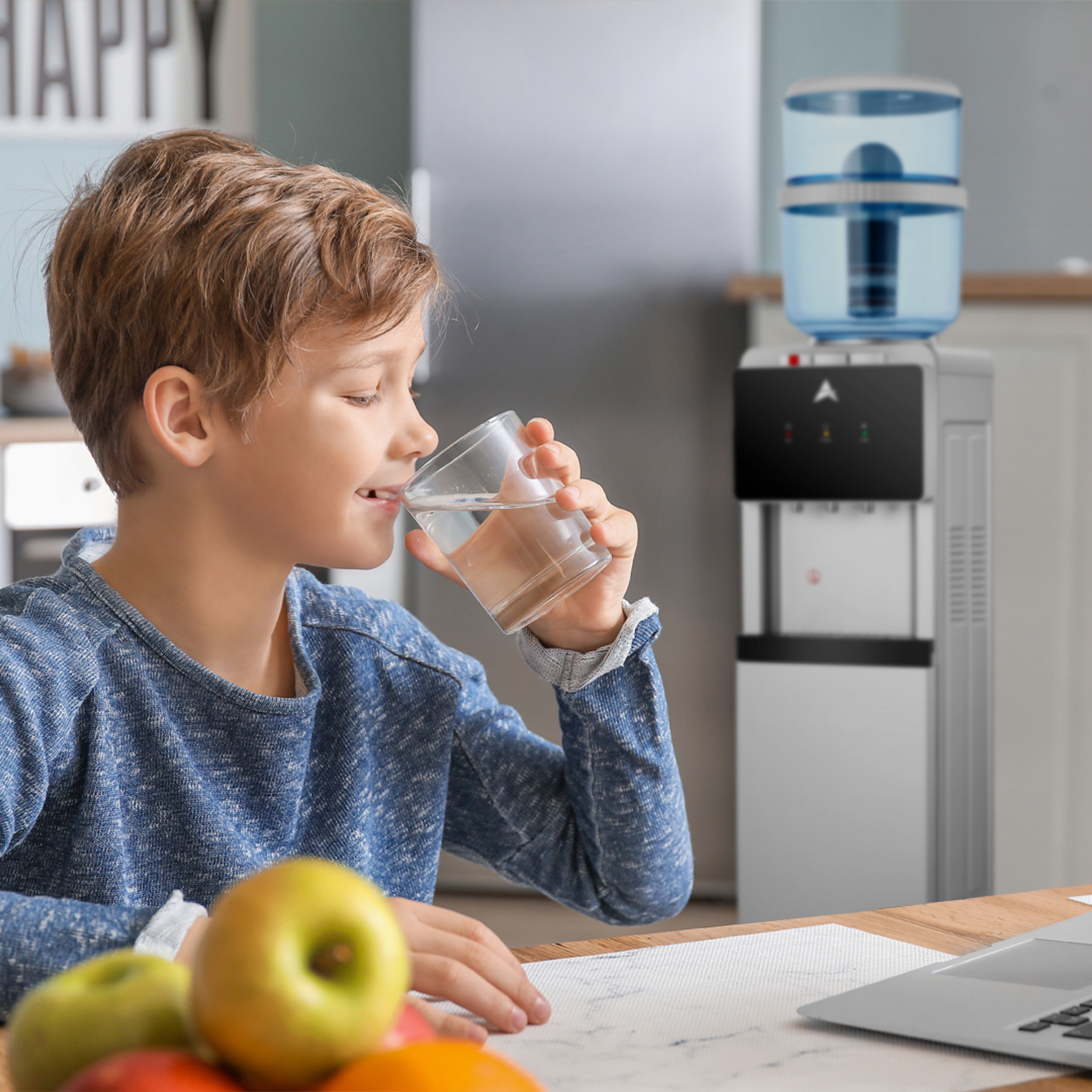 Kid drinking water from Aimex Australia water cooler