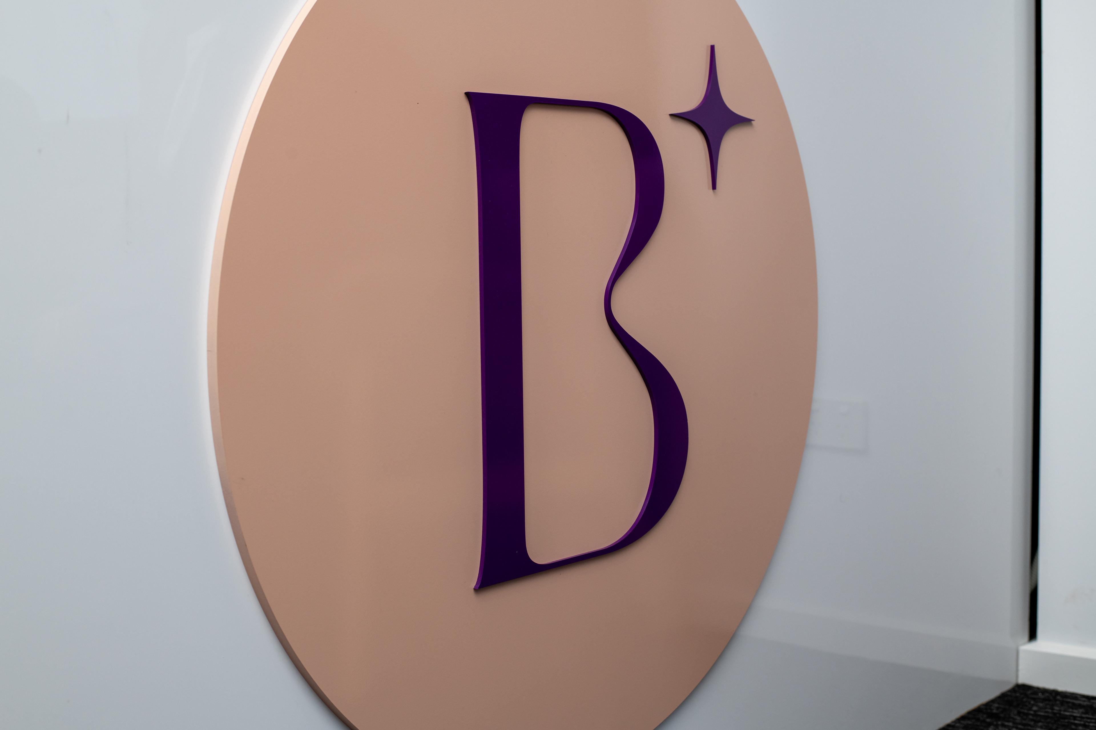Bewitching logo signage at reception