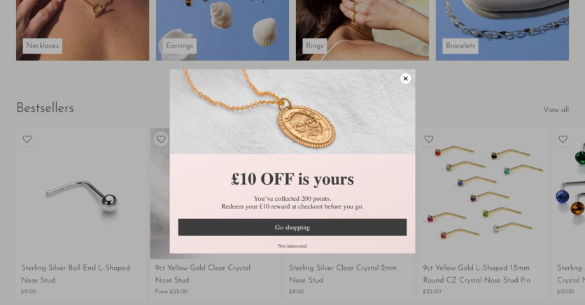 Jewellerybox exit-intent popup: £10 off is yours, you’ve collected 200 points, redeem your reward at checkout before you go