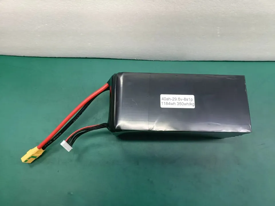 350 Wh/kg 8S1P UAV battery pack with 40 Ah, 29.6 V and 1184 Wh label, power leads and balance connector