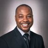 Portrait of Olalekan Ajayi, PharmD, MBA, FACCC