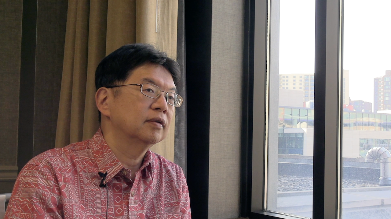 Screenshot of an interview with Naoto Ueno, MD, PhD