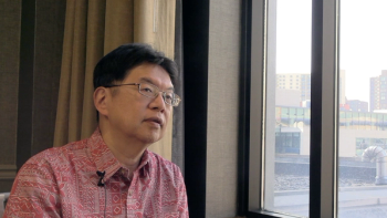 Screenshot of an interview with Naoto Ueno, MD, PhD