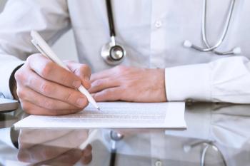 Physician reviewing a case report