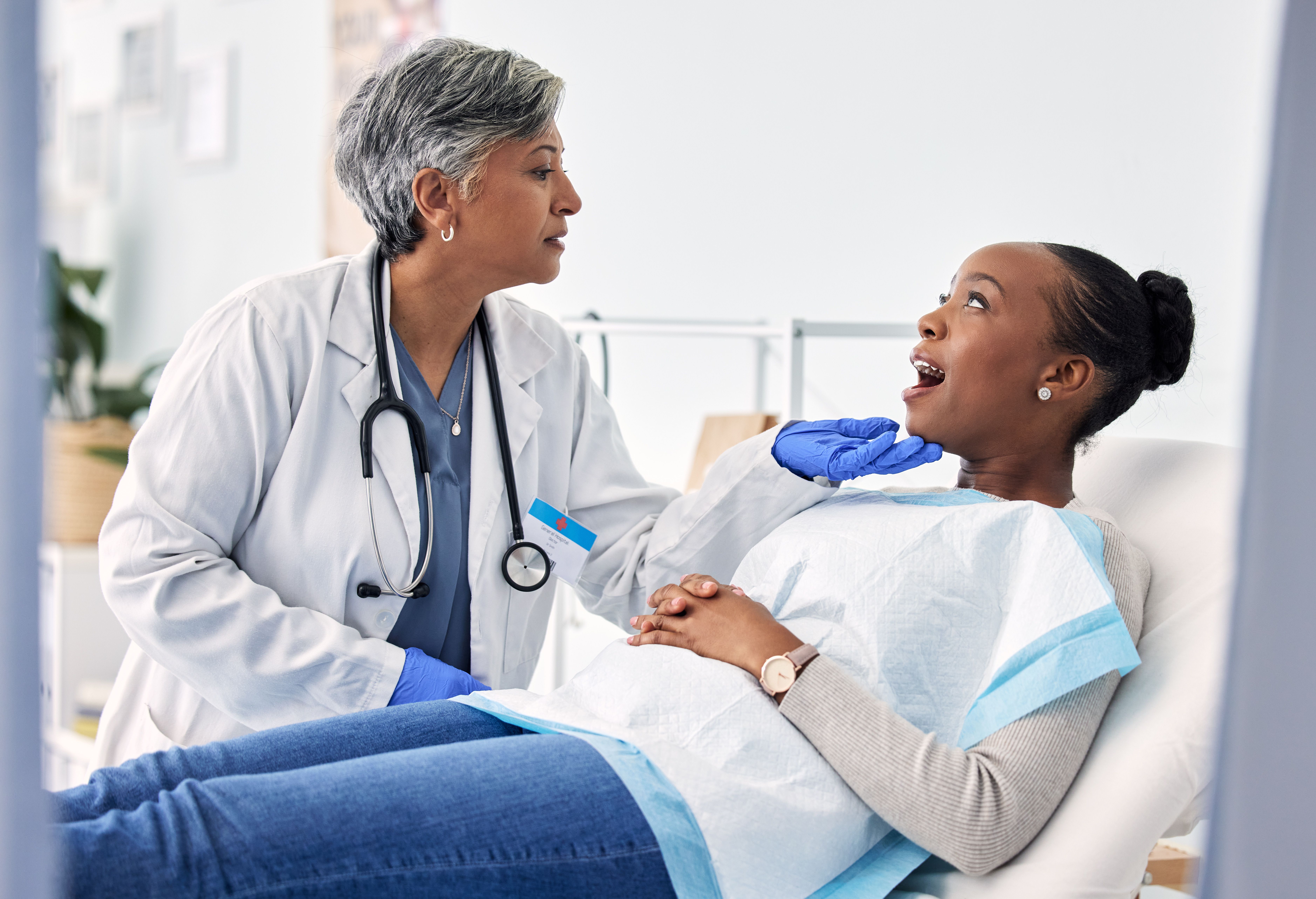 Dentist consulting patient | Image credit: D Theron/peopleimages.com – stock.adobe.com
