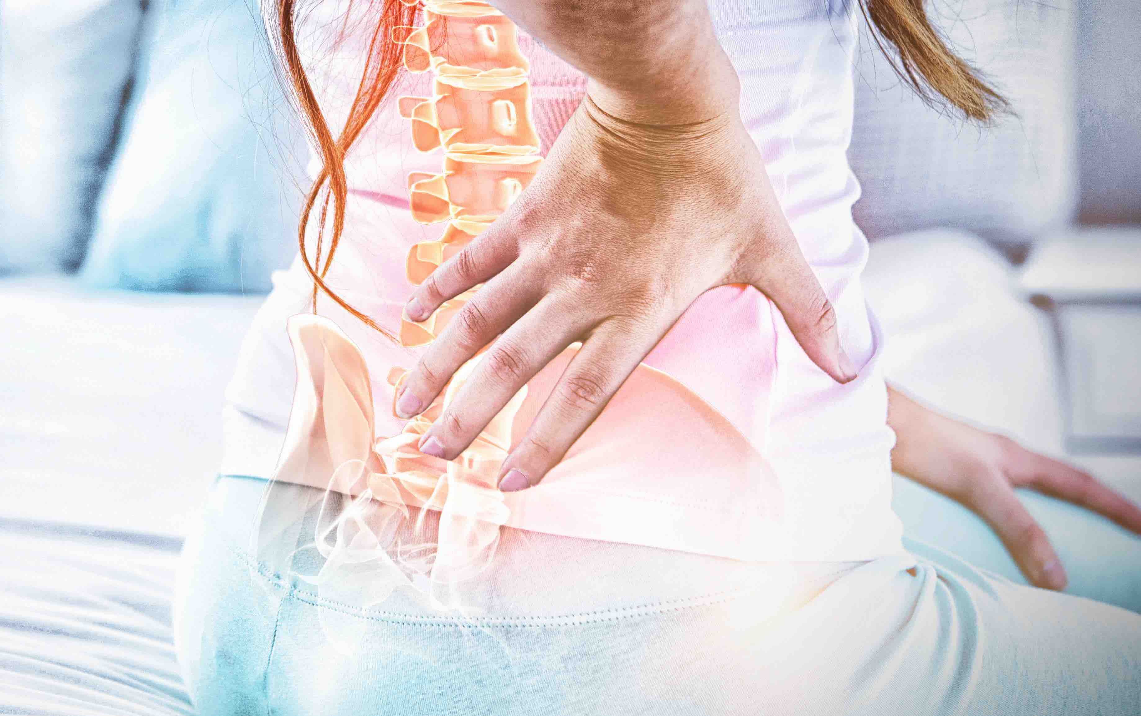 Woman with back pain |  Image credit: vectorfusionart - stock.adobe.com