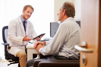 Male doctor and male patient