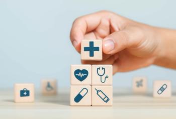 Businessman shows medical network wooden block for health, medicine, insurance, healthcare, care, concept. Medical technology services to solve public - ภัทรชัย รัตนชัยวงค์ - stock.adobe.com.jpeg