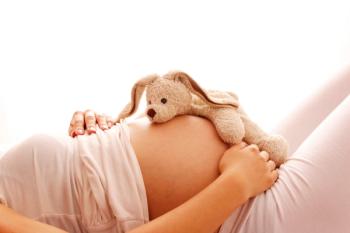 pregnant woman with stuffed animal | Image credit: Kostia - stock.adobe.com