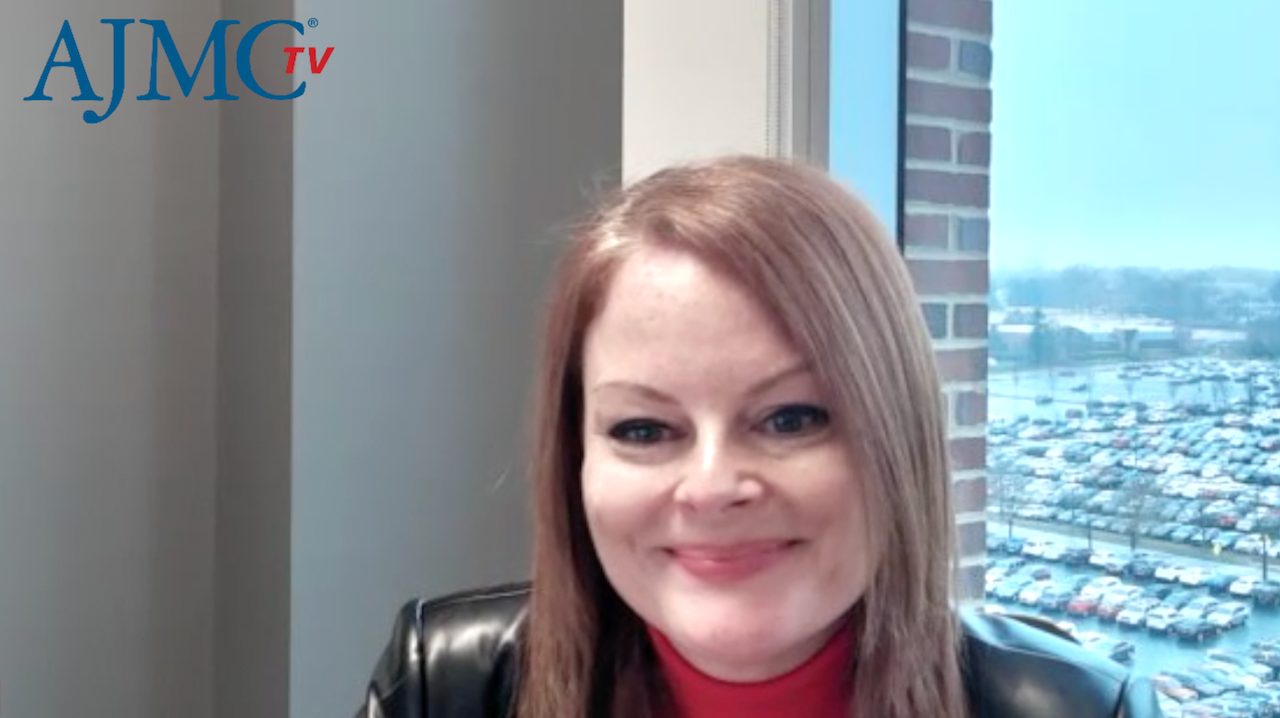 Jennifer Vaughn, MD, smiling during a zoom interview