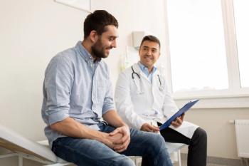 Man with doctor | Image credit: Syda Productions - stock.adobe.com
