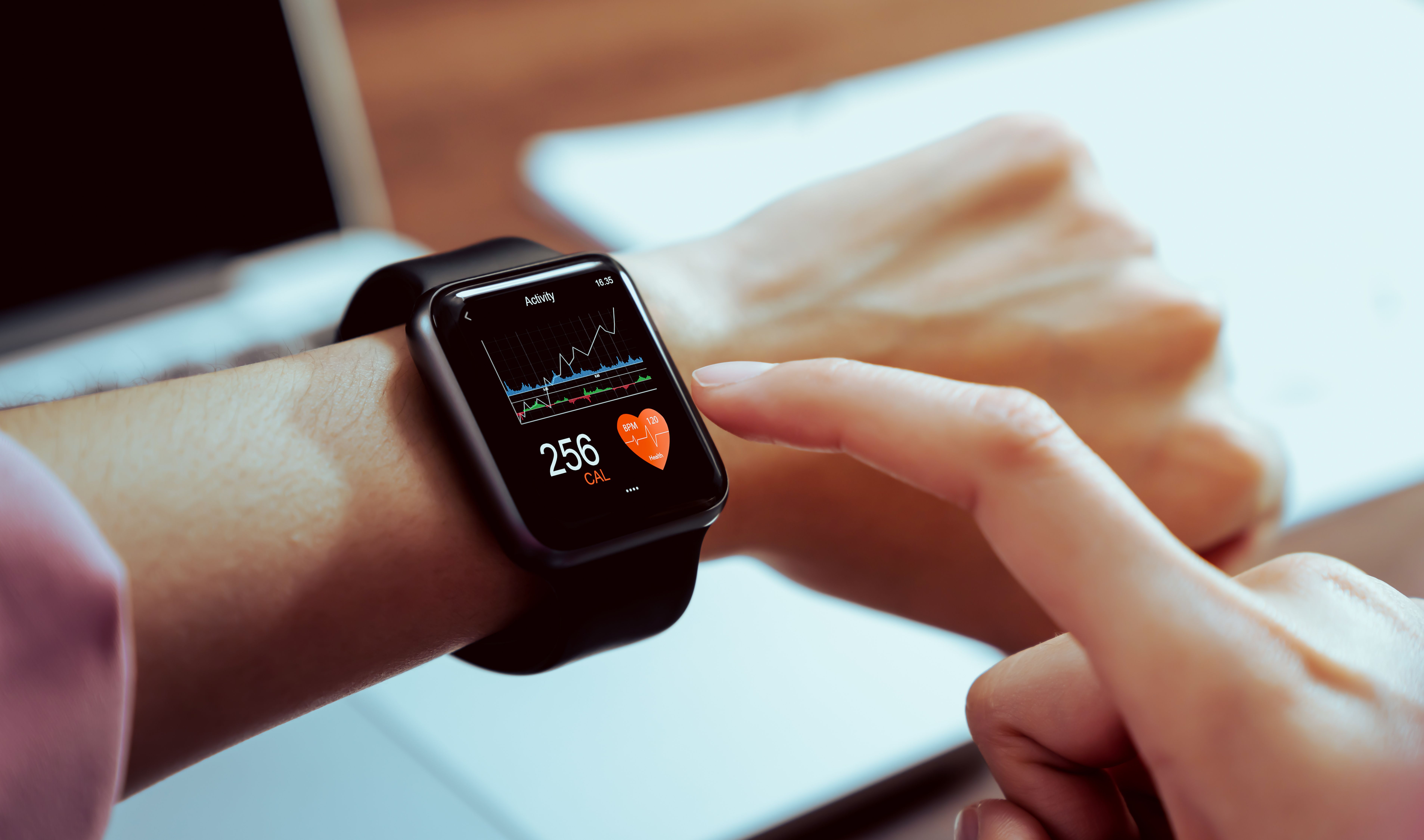 Patient using a smartwatch | Image Credit: sitthiphong - stock.adobe.com