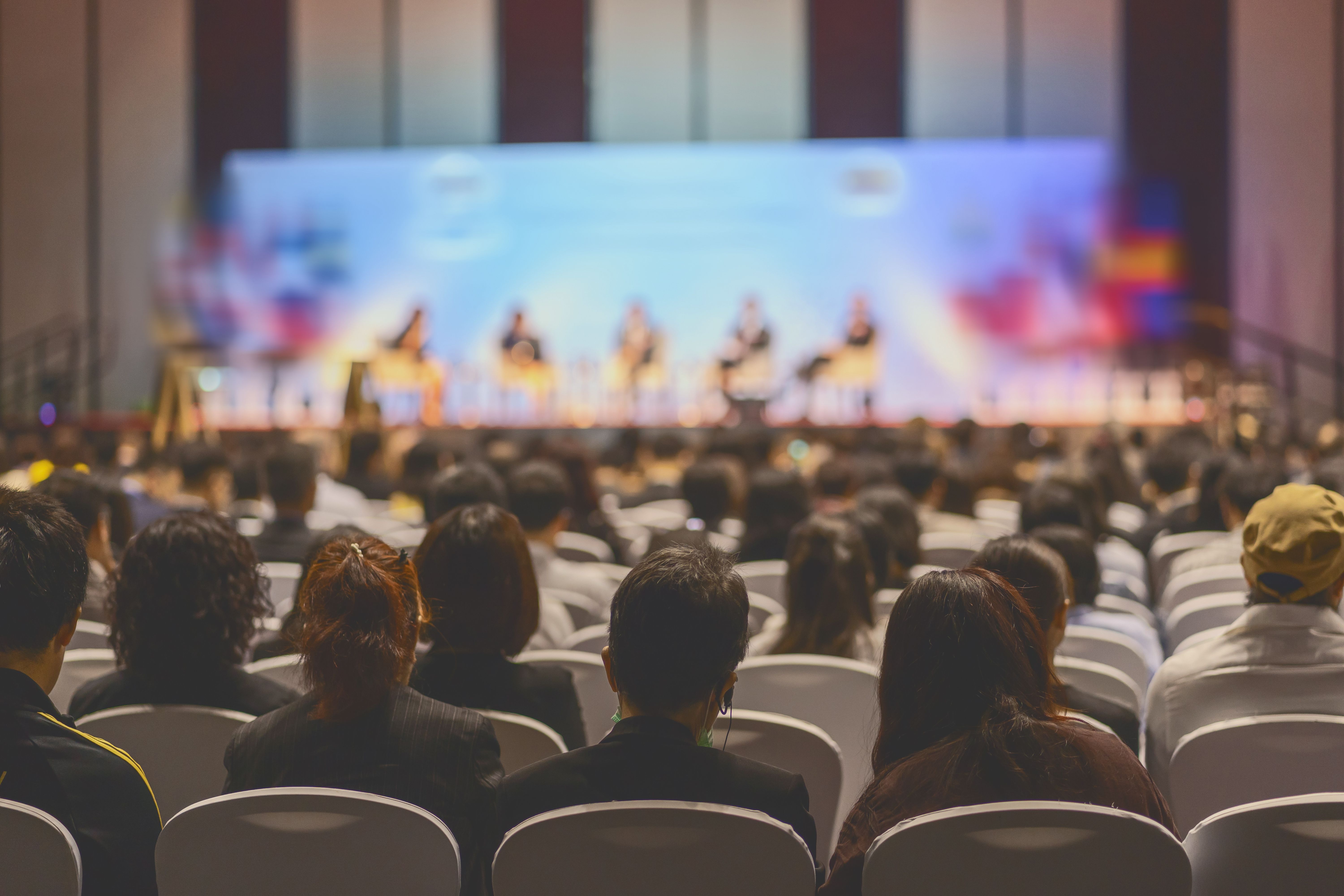 people gathering for conference | Image credit: THANANIT - stock.adobe.com