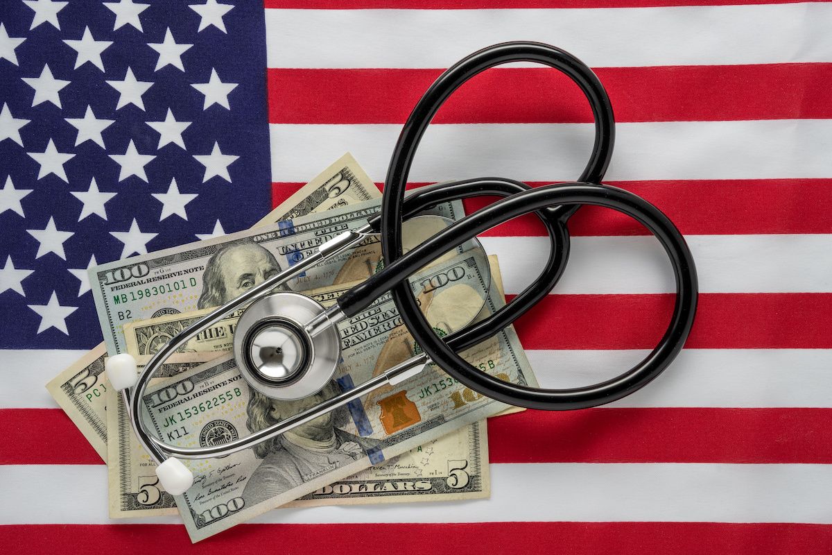 American flag, dollars, stethoscope - Rosemarie Mosteller - stock.adobe.com.jpeg