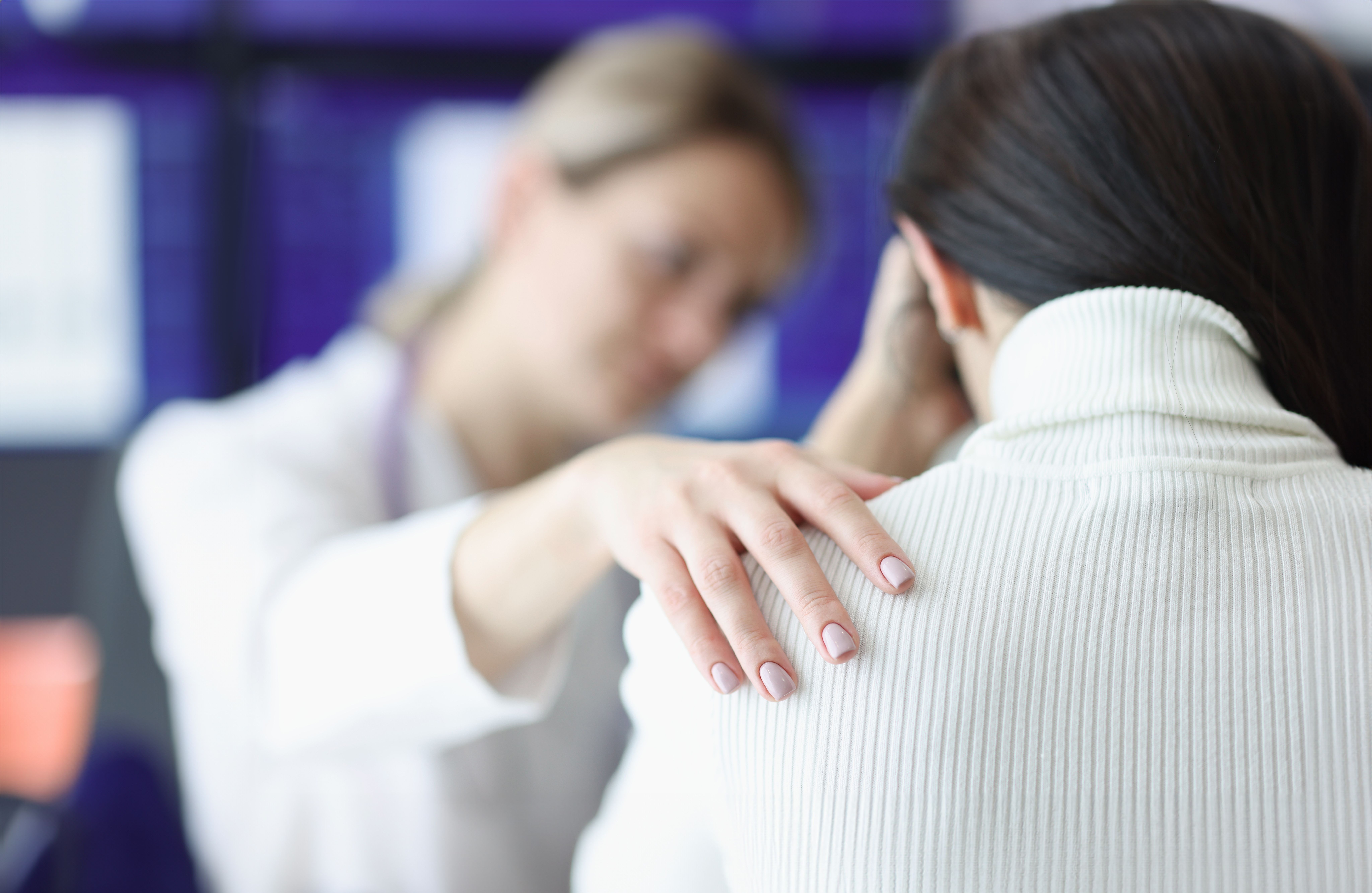 Doctor comforting patient | Image credit: H_Ko - stock.adobe.com