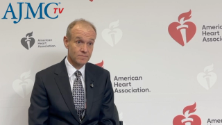 Screenshot of an interview with Stephen Nicholls, MBBS, PhD