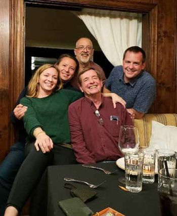 Doug Olson, in red shirt, surrounded by family