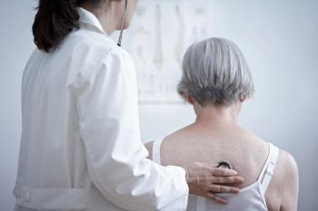 Doctor checking lungs with stethoscope | Image credit: agenturfotografin – stock.adobe.com