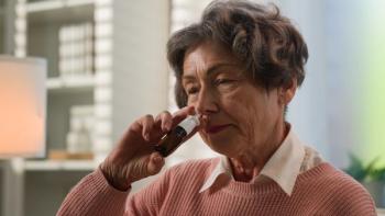 Older woman using nose spray | Image credit: Yuliia – stock.adobe.com