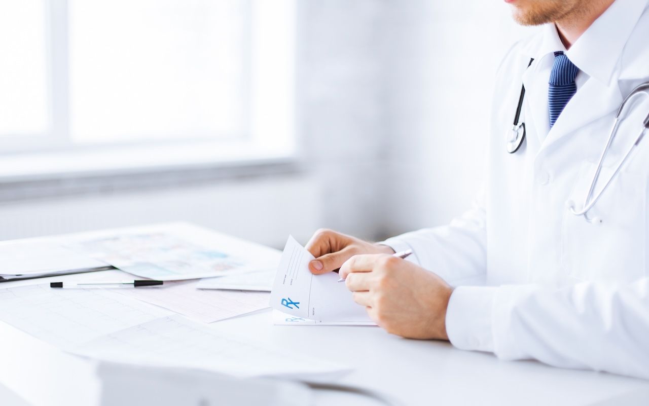 Doctor writing a prescription | Image credit: Syda Productions - stock.adobe.com