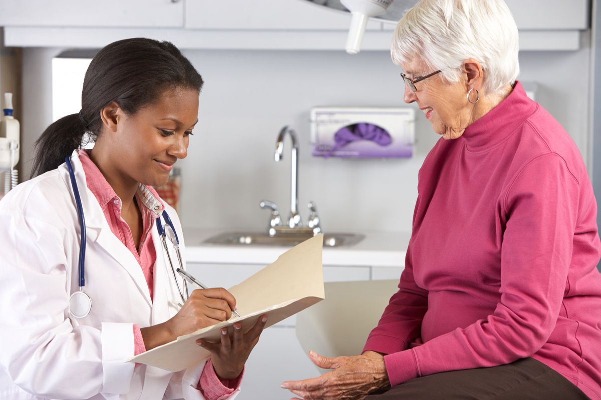 Image of a doctor and patient talking